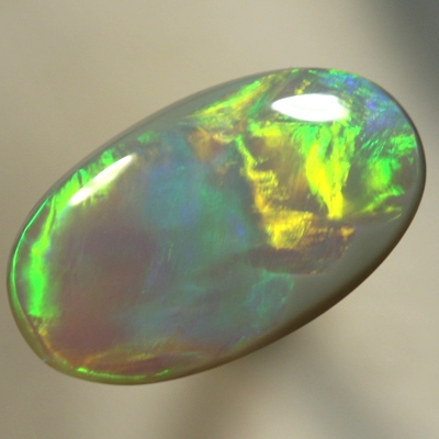 SOLID SEMI BLACK OPAL Very large rolling flashes showing a neon Flame pattern